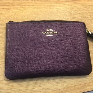 Never used purple coach clutch!